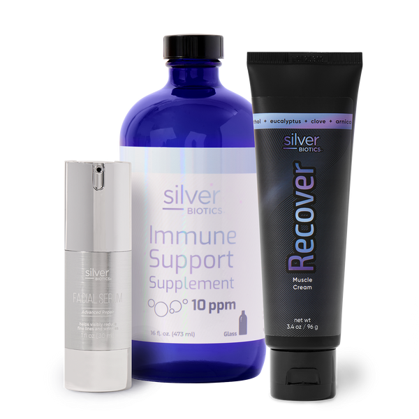 Collection of Silver Biotics products including a supplement, cream, and serum on a white background